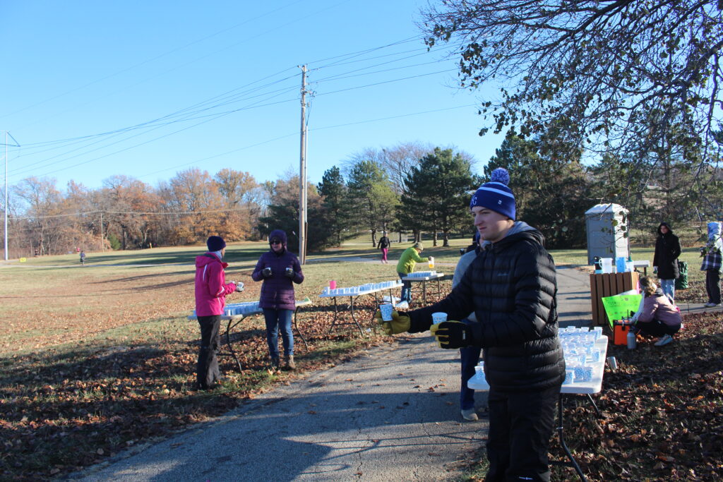 image of volunteers at the gobbler grind marathon in overland park ks